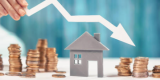 an arrow declines showing the decline in value for housing market